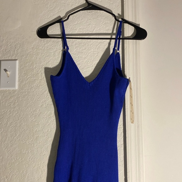 A blue open back knit bobycon dress - Picture 1 of 4